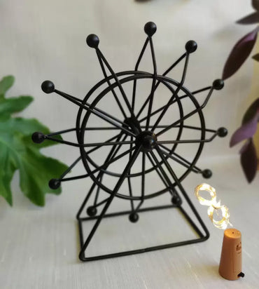 Black Spinning Wheel With LED Light Decorative Showpiece