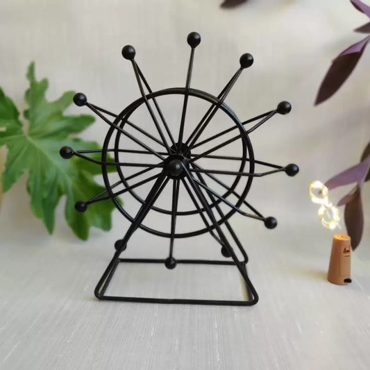 Black Spinning Wheel With LED Light Decorative Showpiece