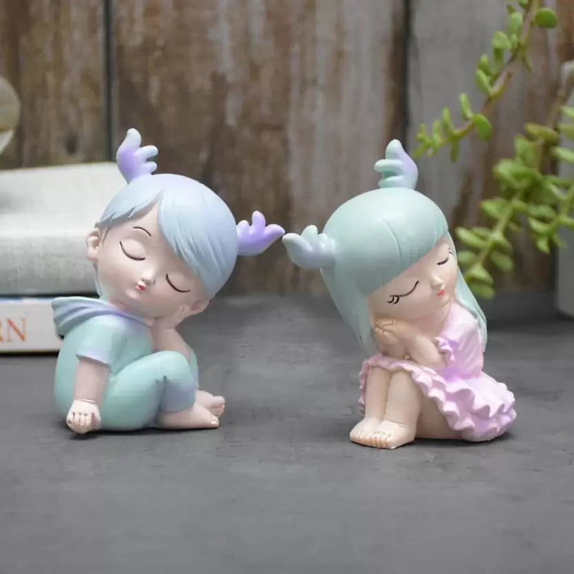 Combo of Miniature Sleepy Boy and Girl Resin Showpieces