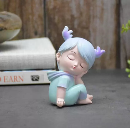 Combo of Miniature Sleepy Boy and Girl Resin Showpieces