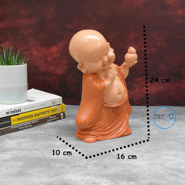 BLESSING BABY MONK SHOWPIECE : ORANGE