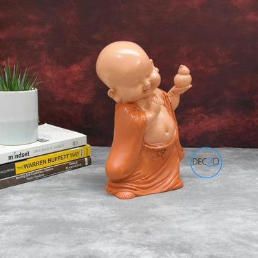 BLESSING BABY MONK SHOWPIECE : ORANGE