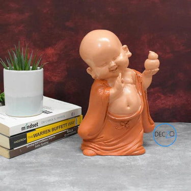 BLESSING BABY MONK SHOWPIECE : ORANGE