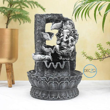 LORD GANESHA RESTING WATER FOUNTAIN : 37 CM, BLACK-SILVER