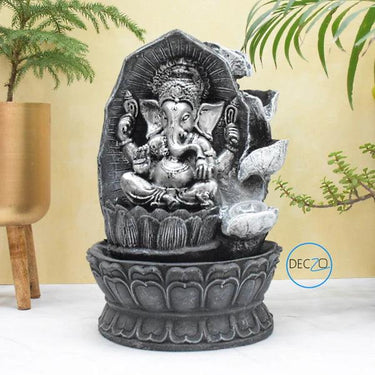 GANESHA SITTING ON LOTUS WATER FOUNTAIN : 37 CM, BLACK-SILVER